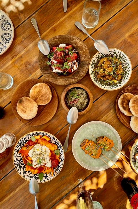 A table full of mezze and grills
